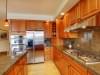 Beautiful kitchen with island, granite and hardwood floor